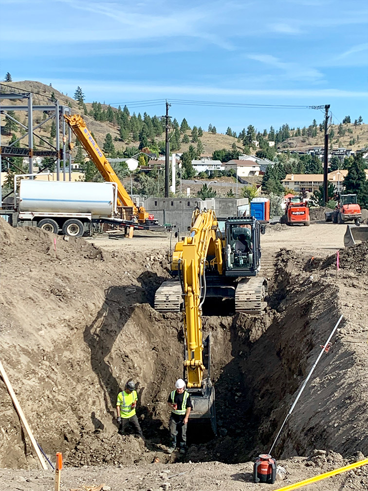 Kamloops property – excavator digging up ground for the car wash, Express AutoSpa