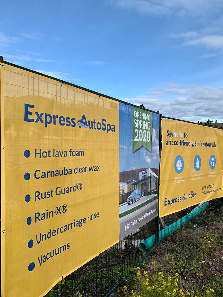 Kamloops property – fence wrap advertising Express AutoSpa