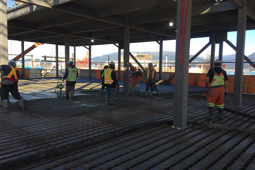 Concrete pouring on the third floor of the NationWide Pender facility