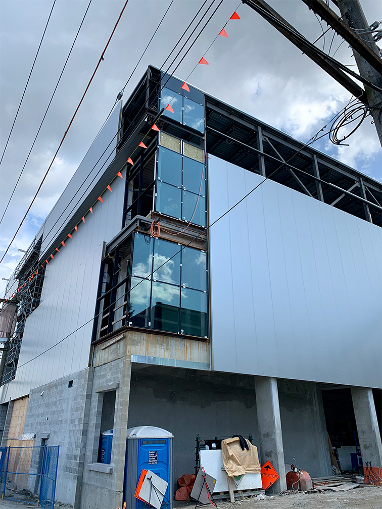 Pender property – cladding and windows in progress on the north west corner