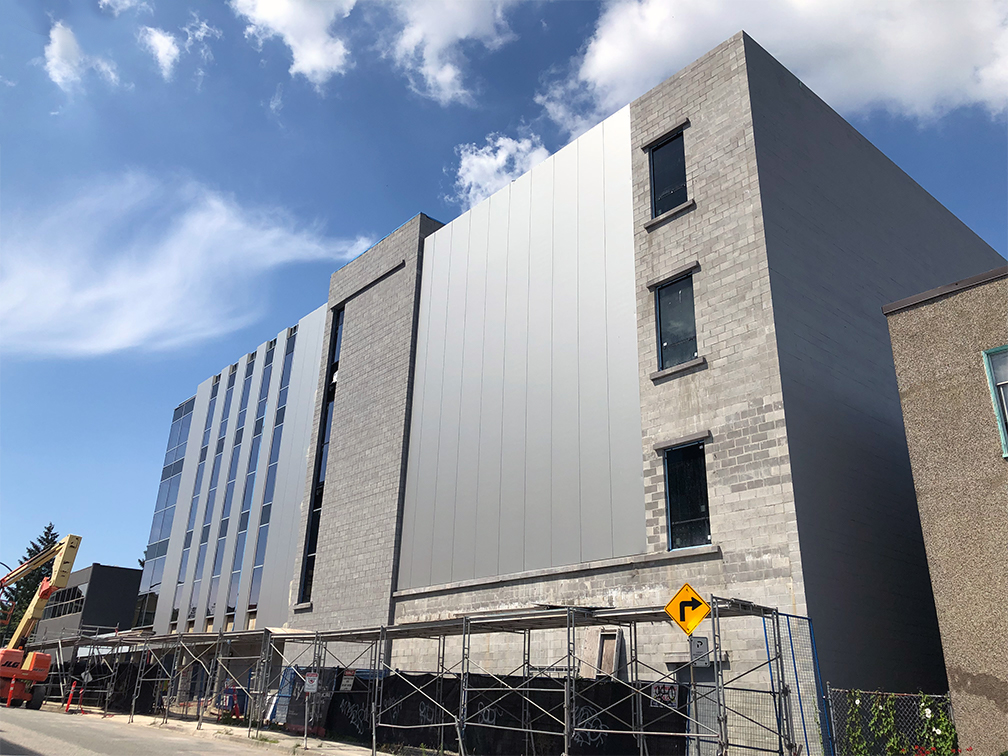 Pender property – cladding and windows complete