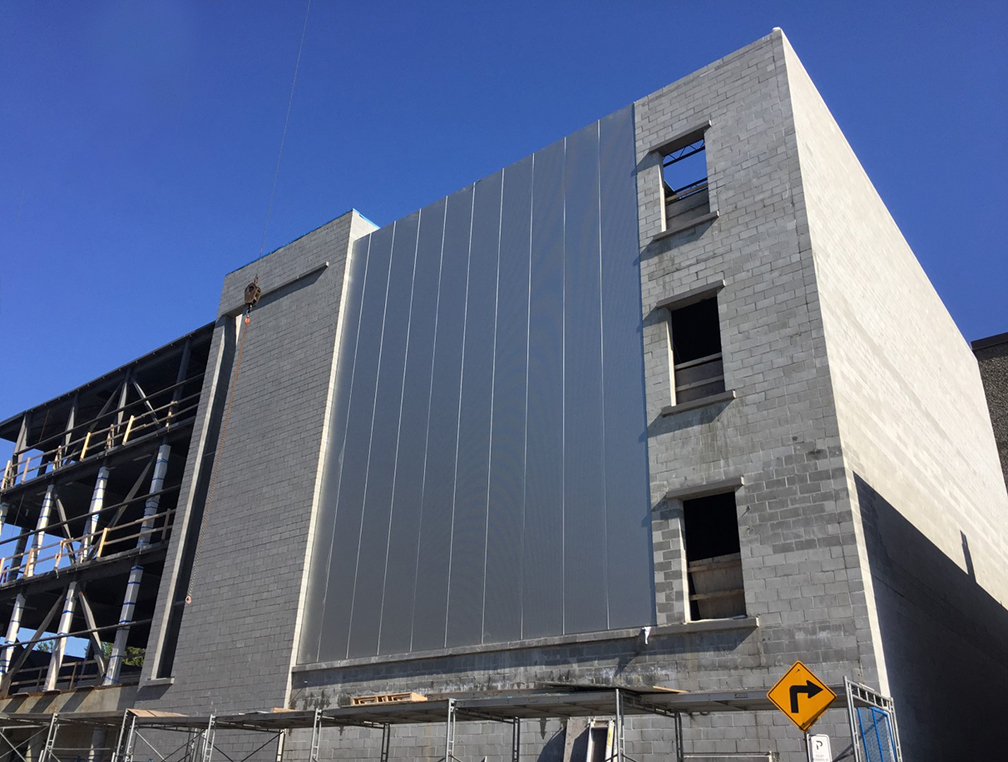 Pender property – metal cladding in progress for the south wall corner