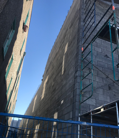Masonry wall on East side, level 1 and 2 complete, October 2018